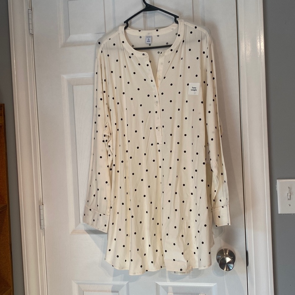 Half button tunic length blouse.